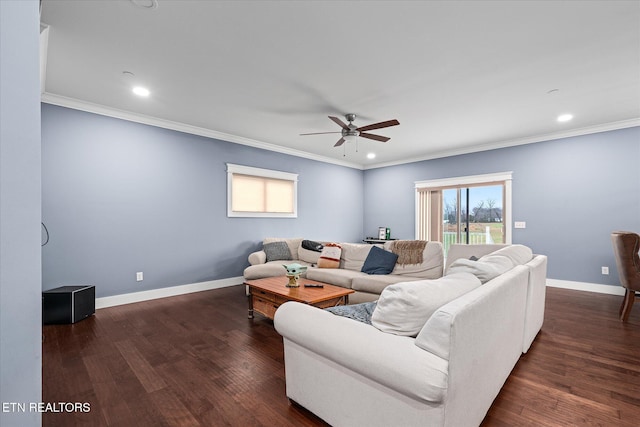 living room featuring ceiling fan, dark wood-type flooring, and ornamental molding