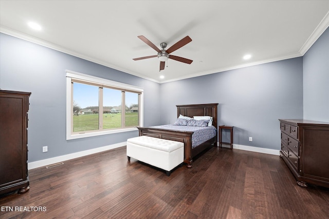 bedroom with ceiling fan, dark hardwood / wood-style flooring, and ornamental molding