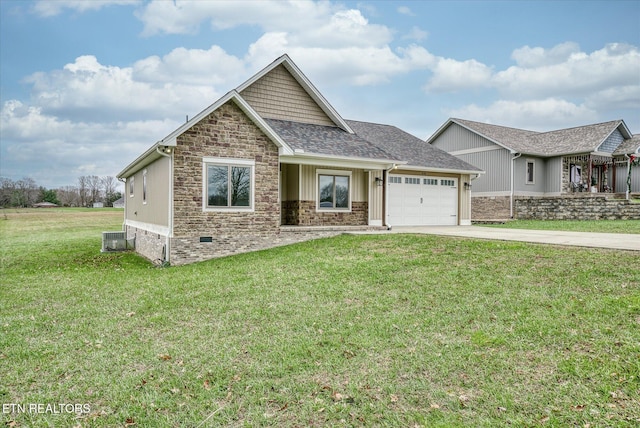 craftsman inspired home with central air condition unit, a front lawn, and a garage