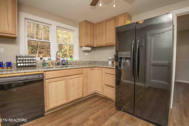 kitchen featuring ceiling fan, sink, dark hardwood / wood-style flooring, light brown cabinetry, and black appliances