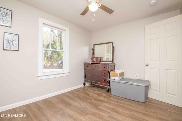 bedroom featuring ceiling fan and light hardwood / wood-style floors