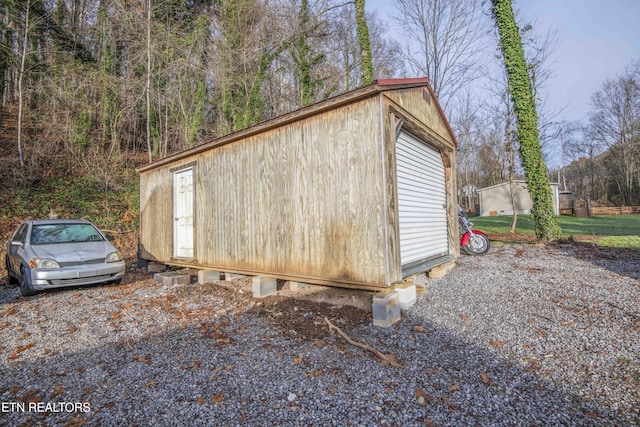 view of outbuilding with a garage