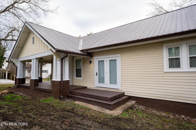 back of house featuring french doors