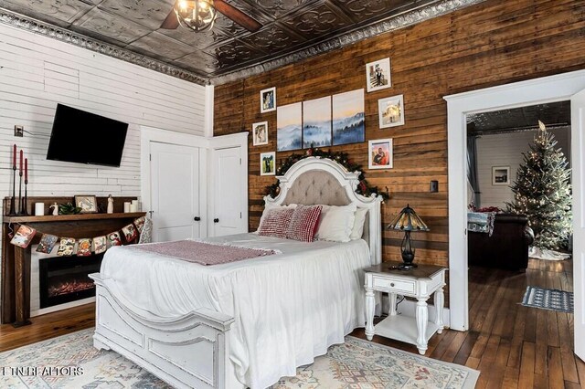 206 E Cedar Street 206E Cedar St E Cedar St, Livingston, TN 38570 - bedroom featuring wooden walls, hardwood / wood-style floors, and ceiling fan