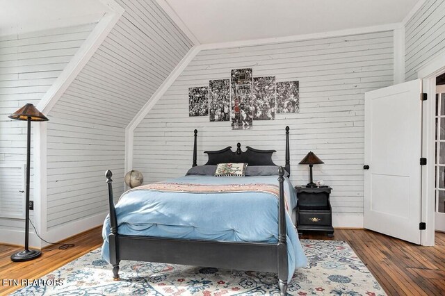206 E Cedar Street 206E Cedar St E Cedar St, Livingston, TN 38570 - bedroom with wooden walls, hardwood / wood-style floors, and lofted ceiling
