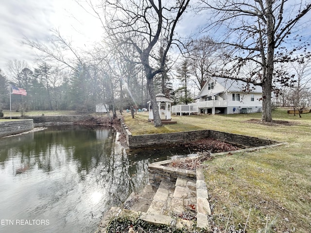 exterior space with a water view