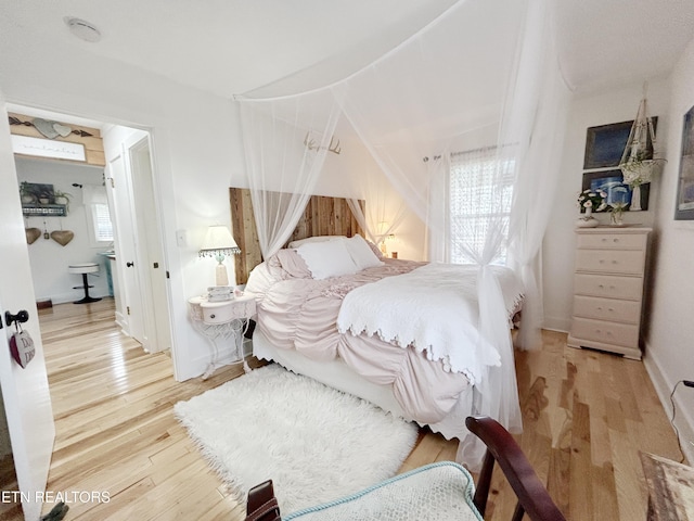 bedroom featuring hardwood / wood-style floors