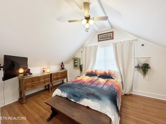 bedroom with wood-type flooring, ceiling fan, and lofted ceiling