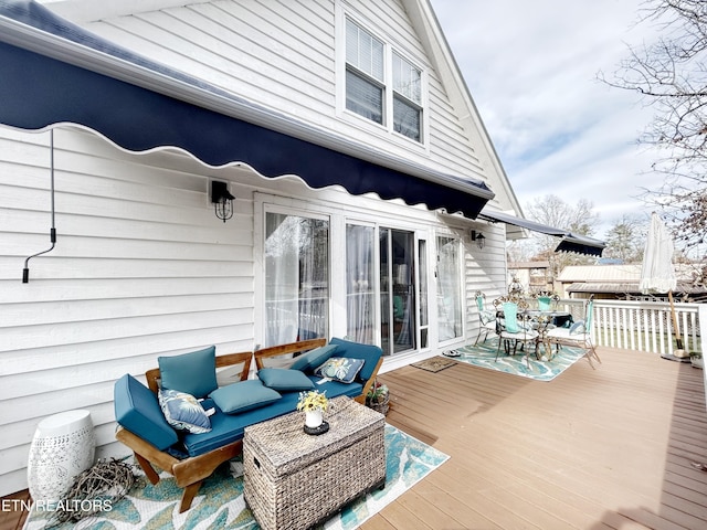 deck with outdoor lounge area