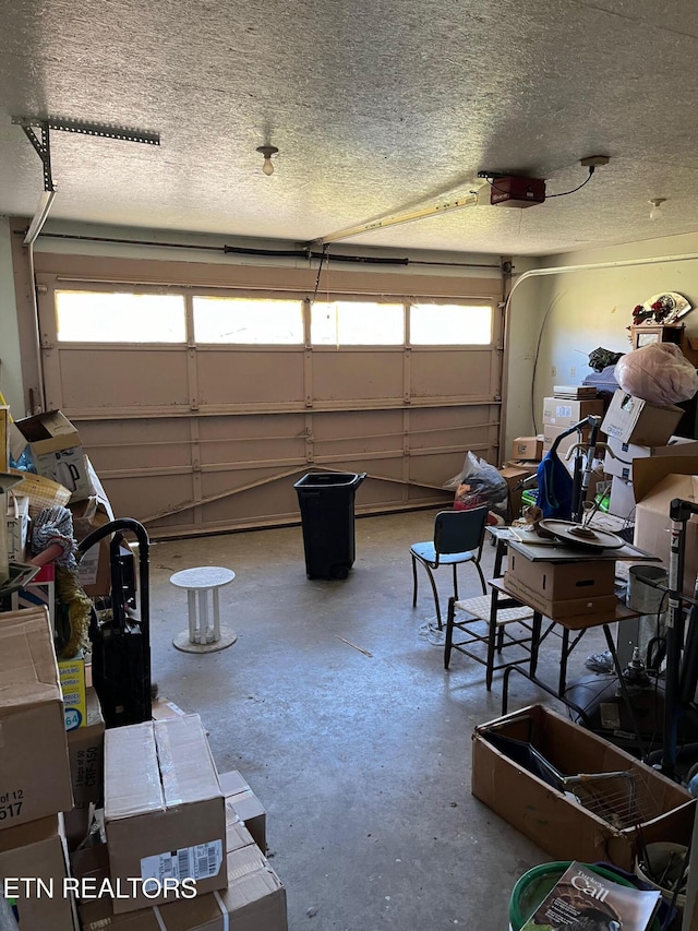 garage featuring a garage door opener