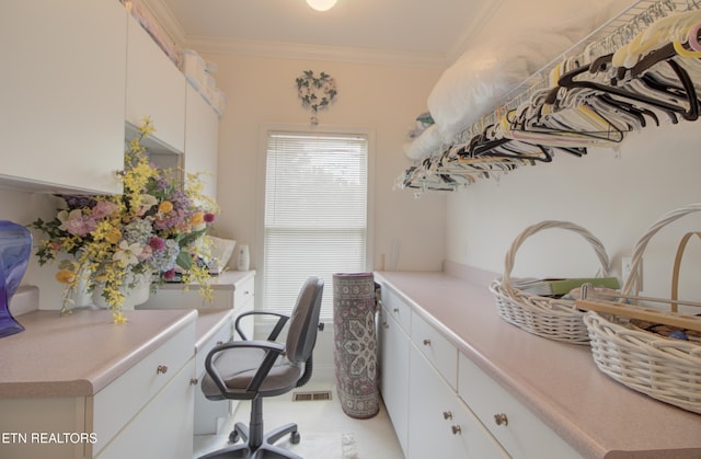 tiled home office with ornamental molding