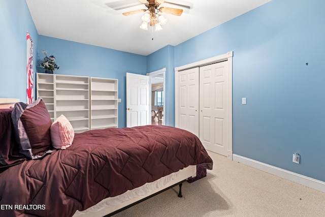 bedroom with ceiling fan and carpet floors