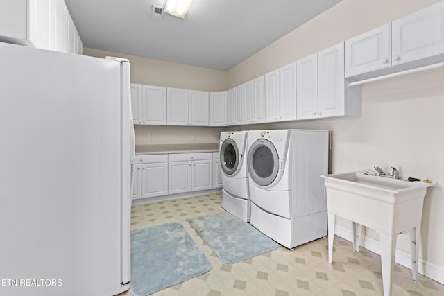 laundry area featuring washer and clothes dryer