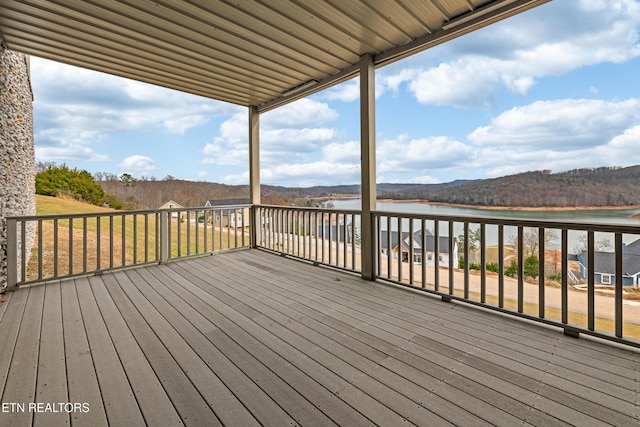 deck featuring a water view