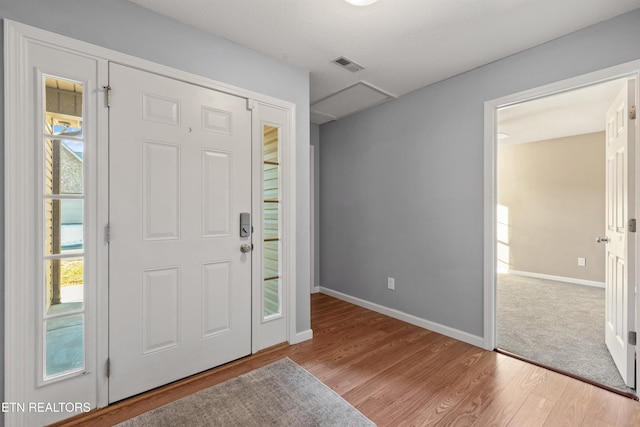 entrance foyer with light hardwood / wood-style floors