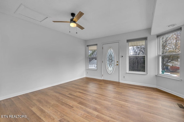 entryway with light hardwood / wood-style floors and ceiling fan