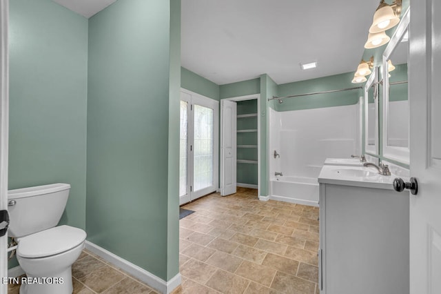 full bathroom featuring vanity, toilet, and tub / shower combination