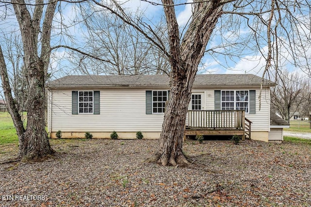 view of front of home with a deck