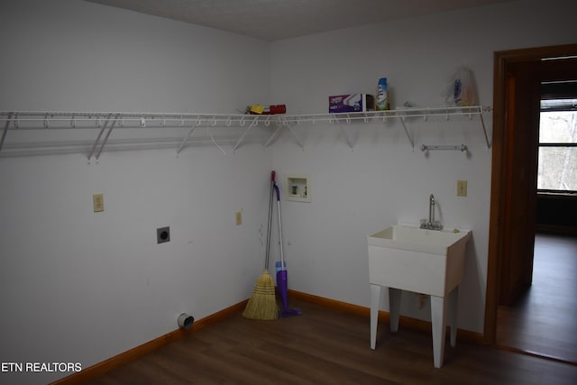 laundry room with washer hookup, hookup for an electric dryer, dark hardwood / wood-style flooring, and a textured ceiling