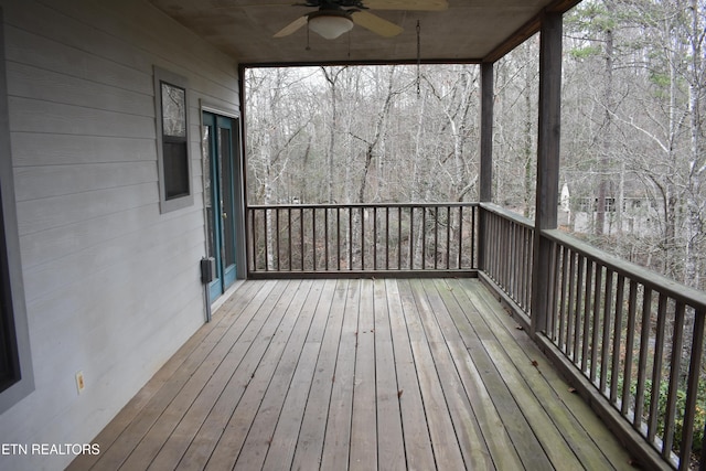 wooden terrace with ceiling fan