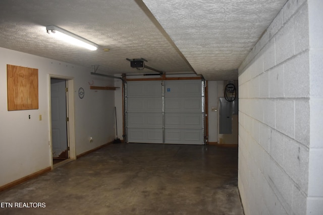 garage featuring a garage door opener and electric panel