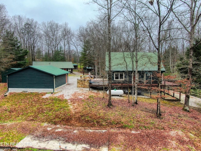 view of side of property with a deck