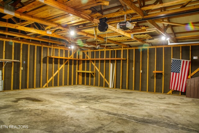 garage featuring a garage door opener