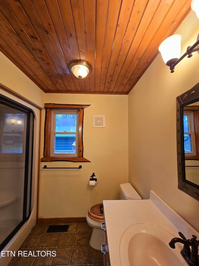 bathroom featuring a shower with door, vanity, wood ceiling, and toilet