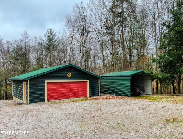 garage with a carport