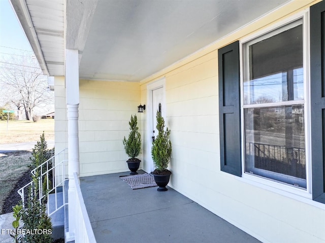 doorway to property with a porch