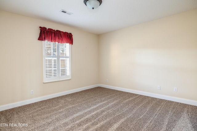 empty room featuring carpet