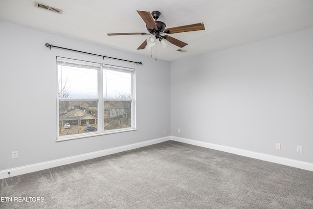 carpeted empty room with ceiling fan