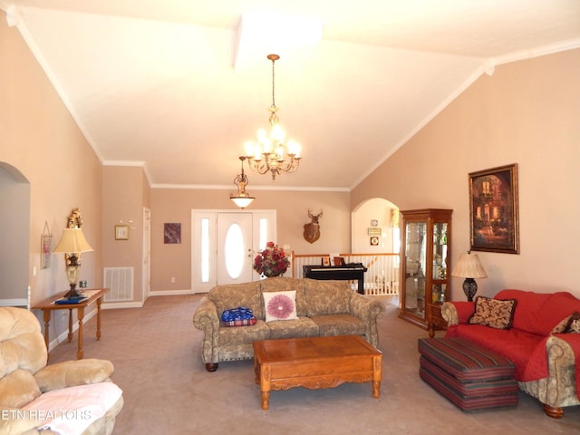 living room with a notable chandelier, light colored carpet, vaulted ceiling, and ornamental molding