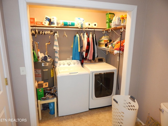 laundry room featuring light carpet and independent washer and dryer