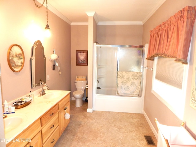 full bathroom featuring vanity, toilet, crown molding, and bath / shower combo with glass door