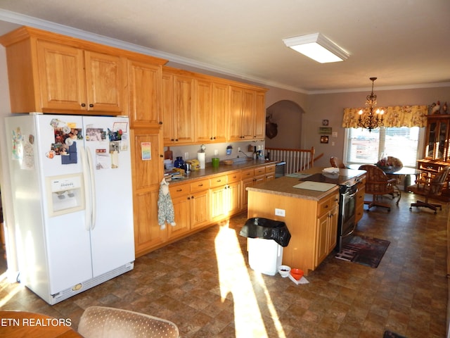 kitchen with ornamental molding, white refrigerator with ice dispenser, pendant lighting, an inviting chandelier, and stainless steel range with electric cooktop