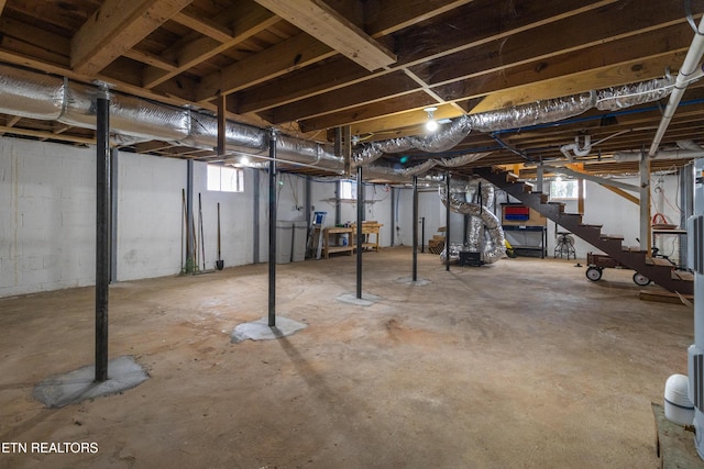 basement featuring washer / clothes dryer and plenty of natural light