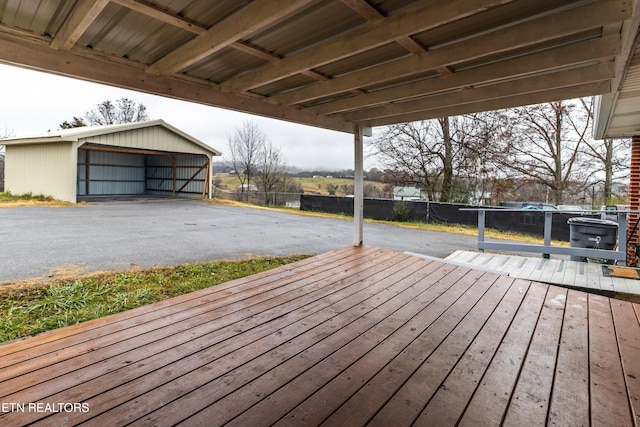 deck featuring an outbuilding