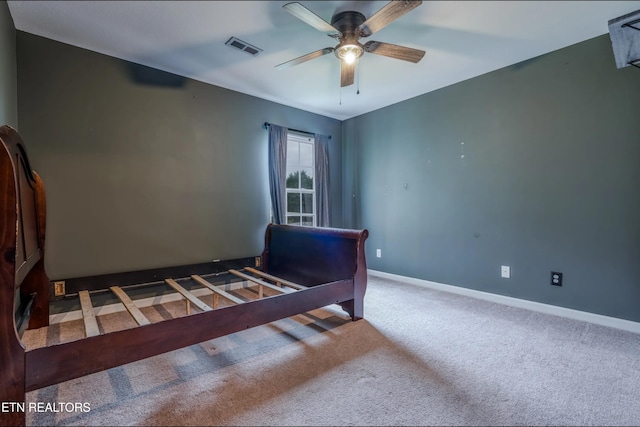 unfurnished bedroom with carpet flooring and ceiling fan