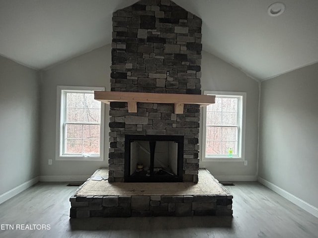 interior details with hardwood / wood-style floors and a fireplace