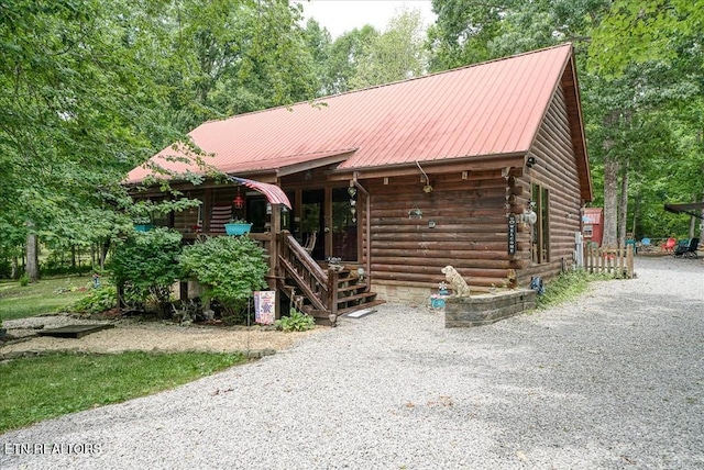 view of log cabin