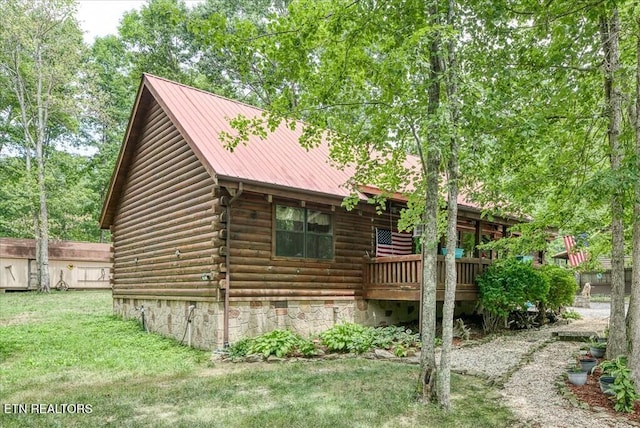 view of property exterior featuring a yard