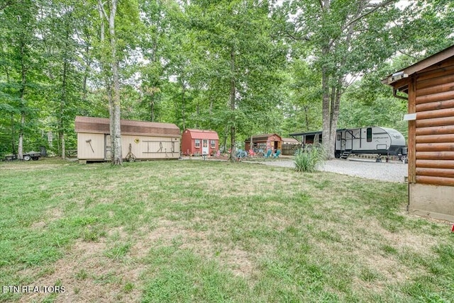 view of yard with a storage shed