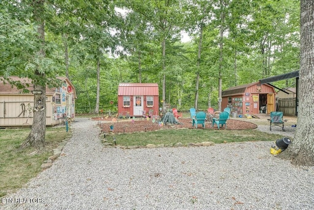 view of play area featuring an outbuilding