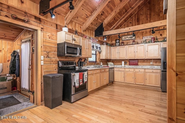 kitchen featuring wooden ceiling, stainless steel appliances, wood walls, light hardwood / wood-style floors, and light brown cabinetry