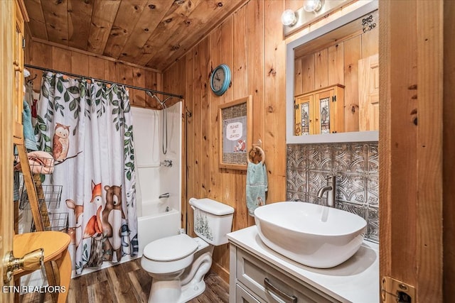 full bathroom with wood ceiling, shower / bathtub combination with curtain, hardwood / wood-style floors, toilet, and wood walls