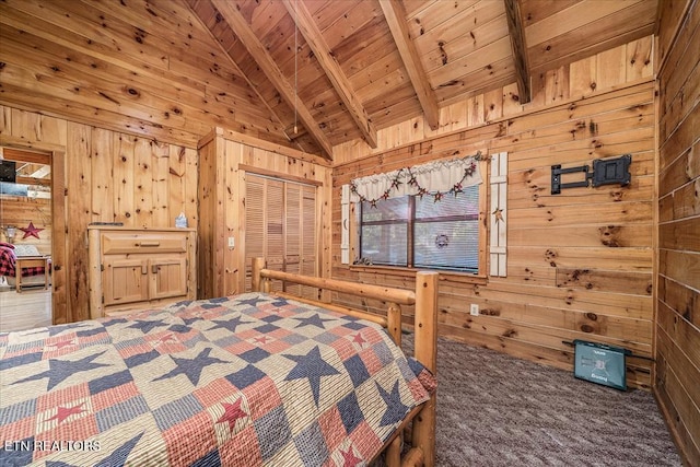 unfurnished bedroom with vaulted ceiling with beams, dark carpet, wooden walls, and wood ceiling