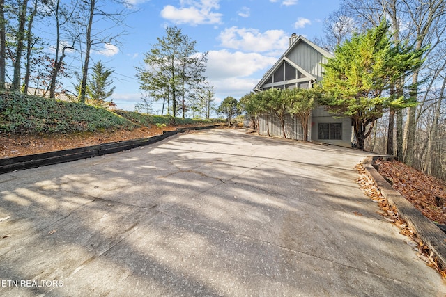 view of property exterior with a garage