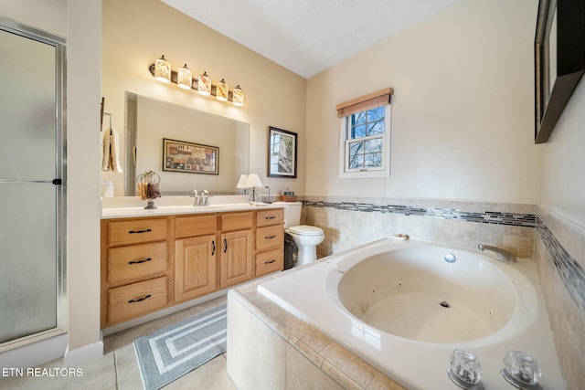 full bathroom with plus walk in shower, tile patterned floors, a textured ceiling, toilet, and vanity