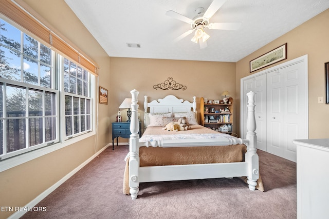 bedroom featuring carpet flooring, a closet, and ceiling fan